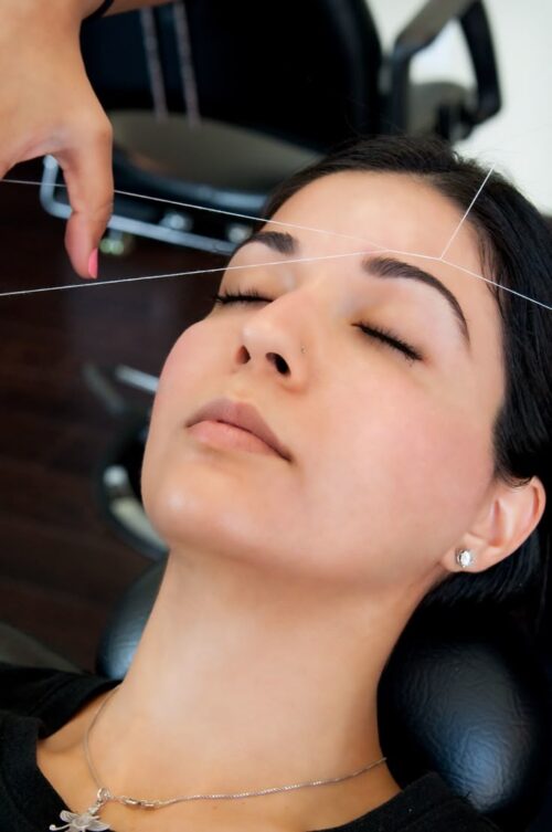 Women Eye Threading
